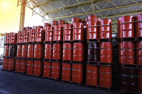 lubricant barrels on warehouse